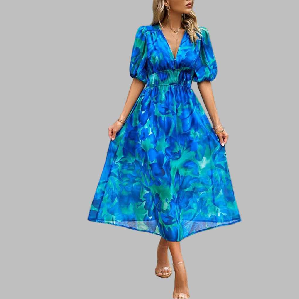 "Women's casual V-neck midi dress in breathable cotton, features short sleeves and a relaxed silhouette for summer comfort."