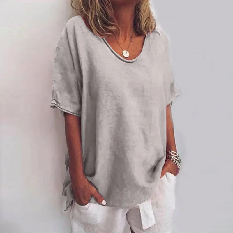 Losvallende damesblouse met V-hals en korte mouwen