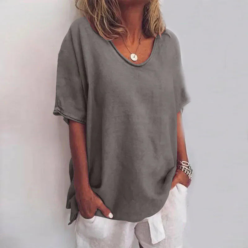 Losvallende damesblouse met V-hals en korte mouwen