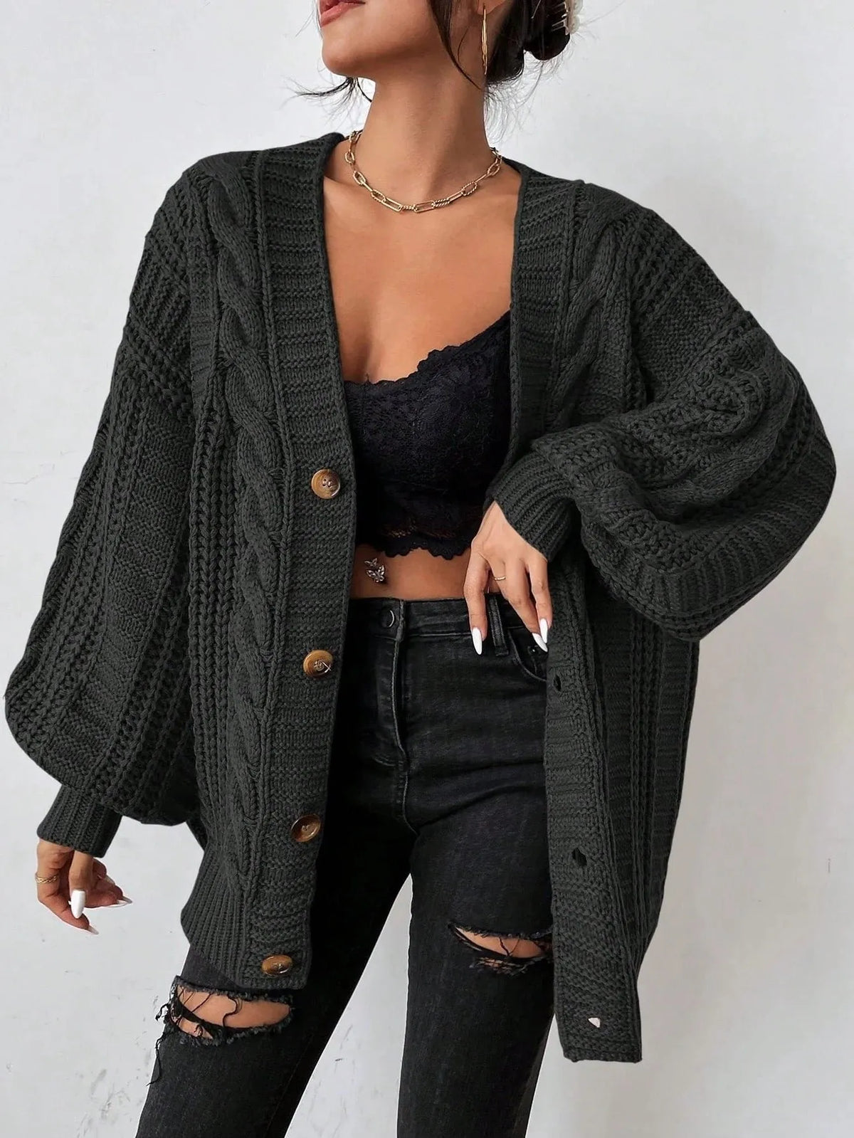 Zaina oversized kabelgebreid damesvest met knoopsluiting