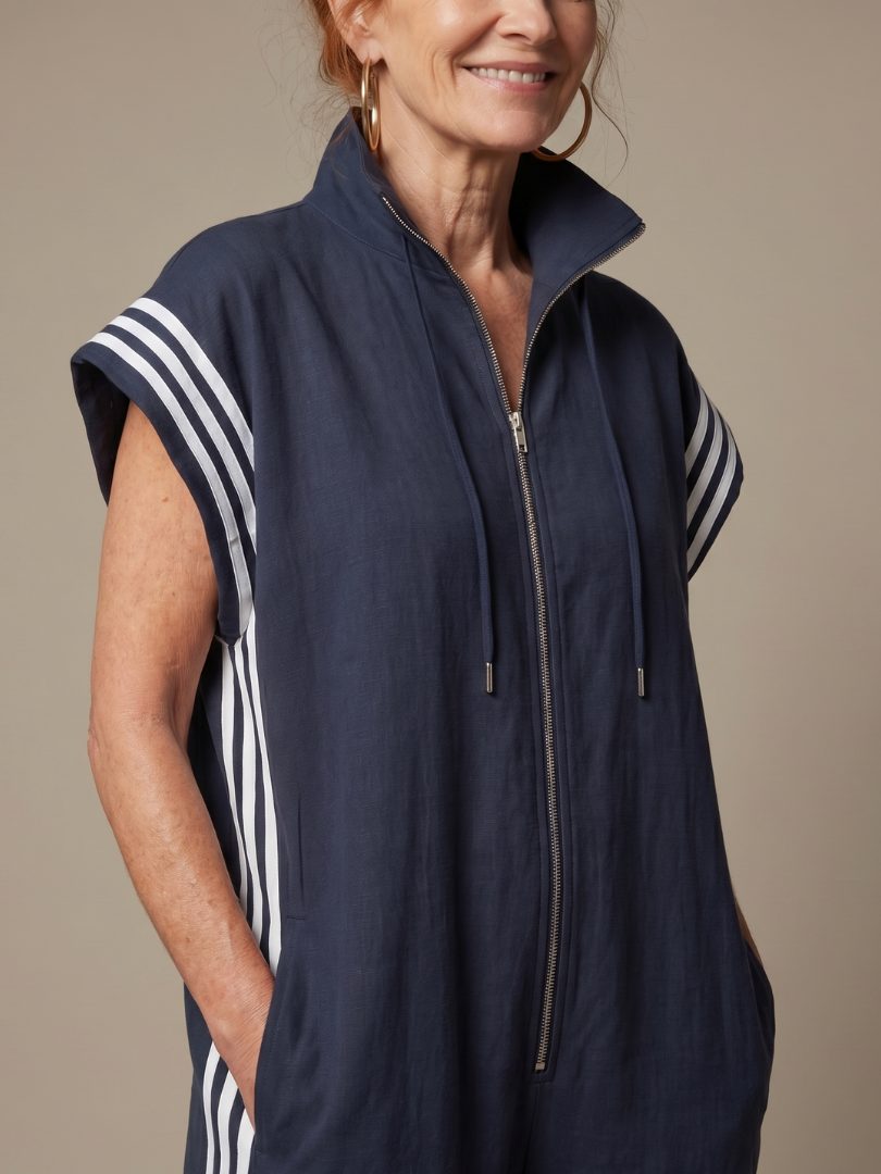Jumpsuit met gestreepte panelen, rits voorop en korte mouwen voor dames